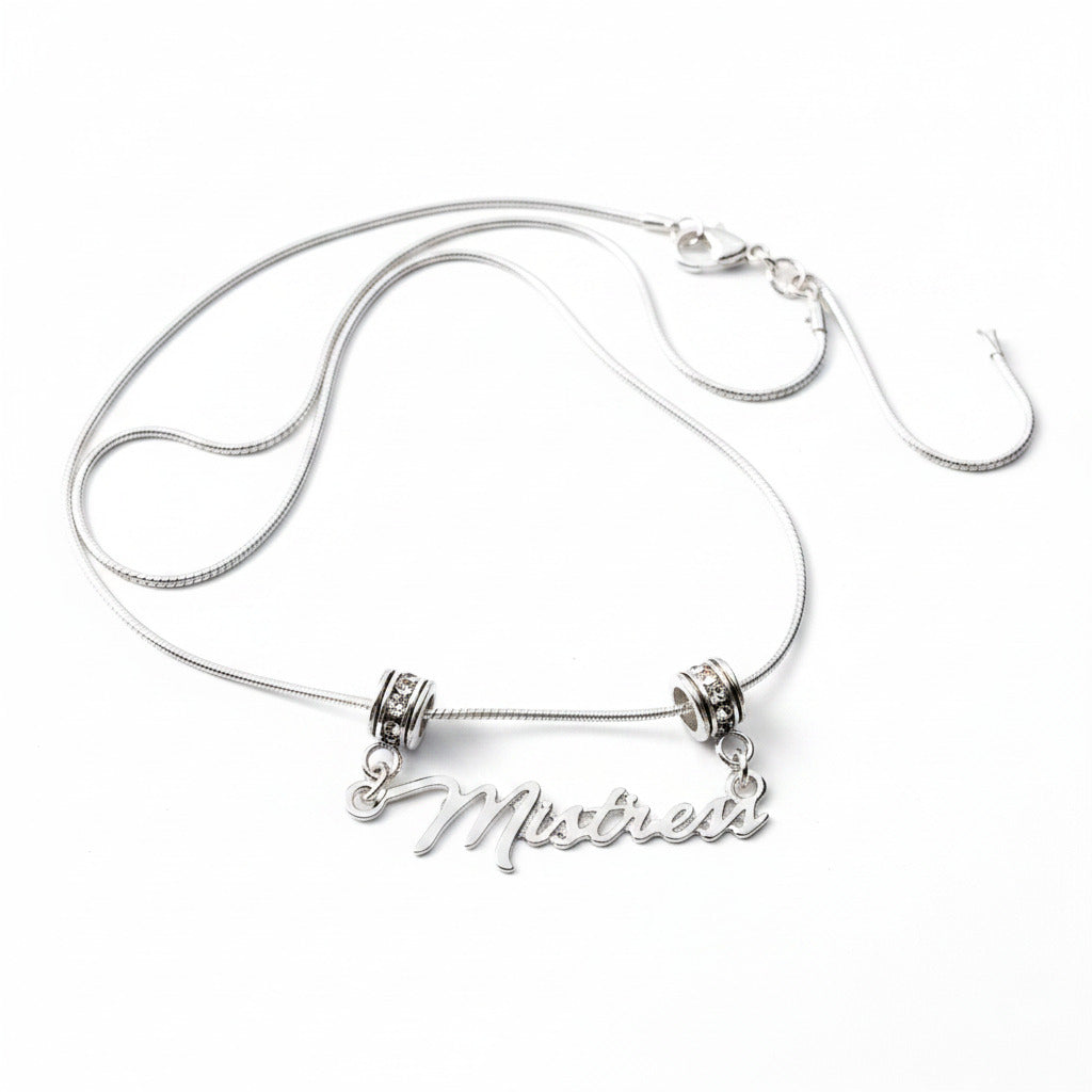 A silver necklace with a QOS logo pendant, displayed on a white background.