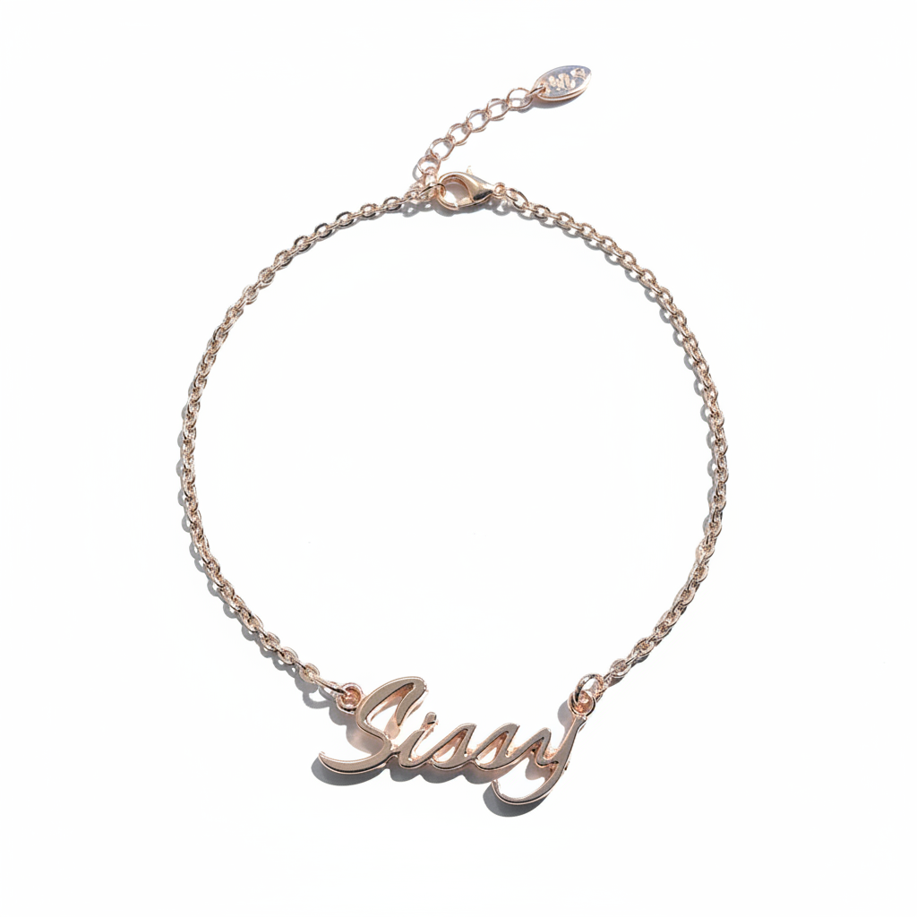 Rose gold chain anklet with the word 'Sissy' inscribed on it, displayed against a white background.