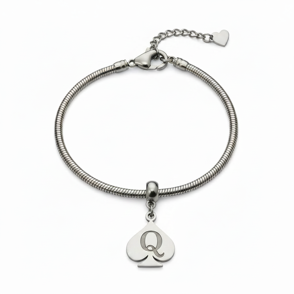 A silver snake chain bracelet featuring a heart-shaped charm engraved with the letter 'Q' and a small heart charm, displayed on a clean white background.