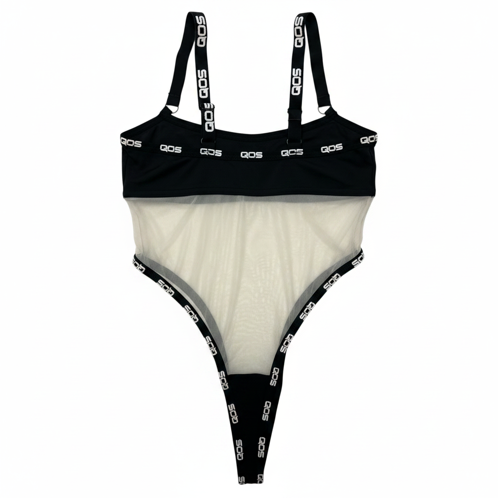 A black and white sheer mesh one-piece lingerie bodysuit with white 'GQS' brand lettering printed on the black straps and trim, displayed flat against a solid white background.