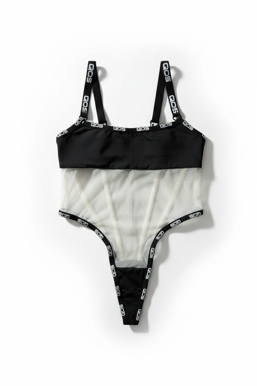 A black and white asymmetrical one-piece swimsuit with a solid black top band, a sheer white mesh midsection, and black straps printed with the white 'OOS' logo, laid flat on a white background.