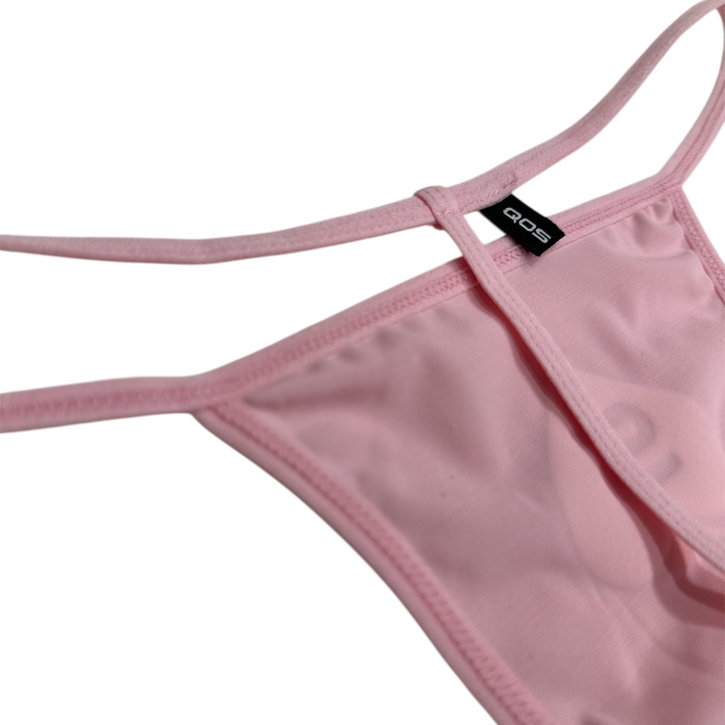 Pink thong with a brand label on a white background