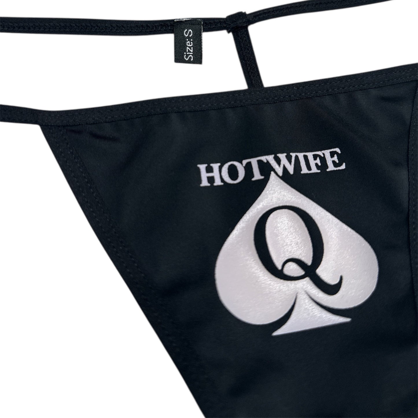 Black thong with 'HOTWIFE Q' logo on a white background