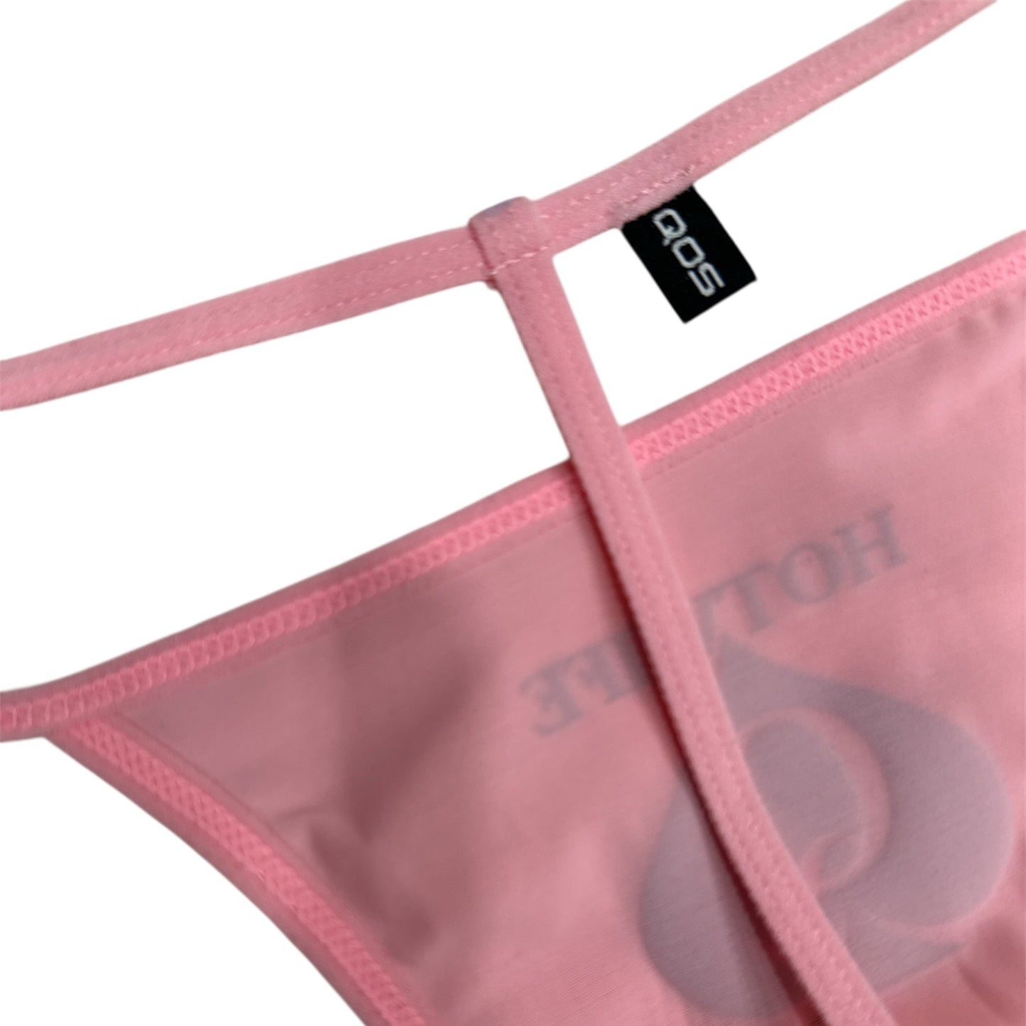 Pink mesh lingerie with brand label on a white background