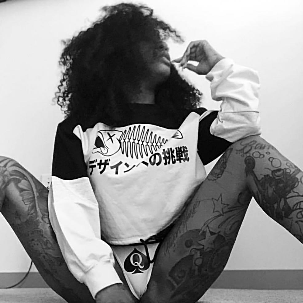 Model @iamtyliyahmonroe with White QOS Thong 
